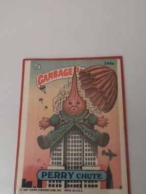 Topps Garbage Pail Kids Card — Pink Background with Green Outfit